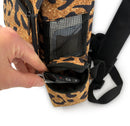 Leopard print portable oxygen concentrator backpack with zip pocket holding a car key fob