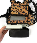 Leopard print backpack for Inogen One G3 with mesh panel, zippered pocket, and oxygen battery.
