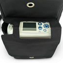 Portable oxygen concentrator in a black carrying case with clear display window