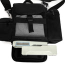Black carry bag with mesh front pocket holding portable oxygen concentrator, side pouches visible
