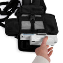Hand placing battery into black Inogen One G3 backpack with mesh pocket