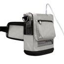 Gray oxygen concentrator carry bag with mesh panels, zippered pocket, attached waist strap, and nasal cannula tubing.