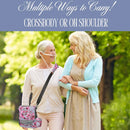 Senior woman with nasal cannula outdoors, carrying floral oxygen concentrator bag crossbody, walking arm in arm with younger woman.