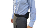 Man wearing oxygen concentrator waist belt carrier over dress shirt and pants