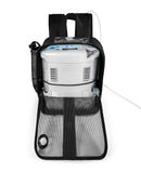 Portable oxygen concentrator in black mesh backpack with open front panel