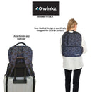 Black leopard print backpack for CPAP, BIPAP machines, shown on suitcase and worn by woman